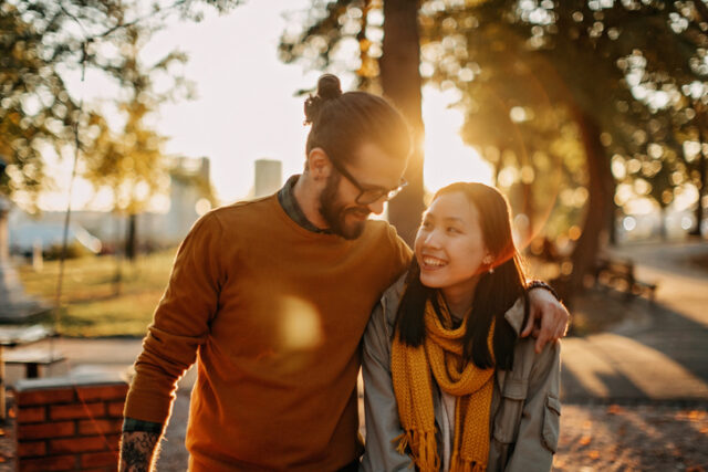 romantic couple in sunset forest